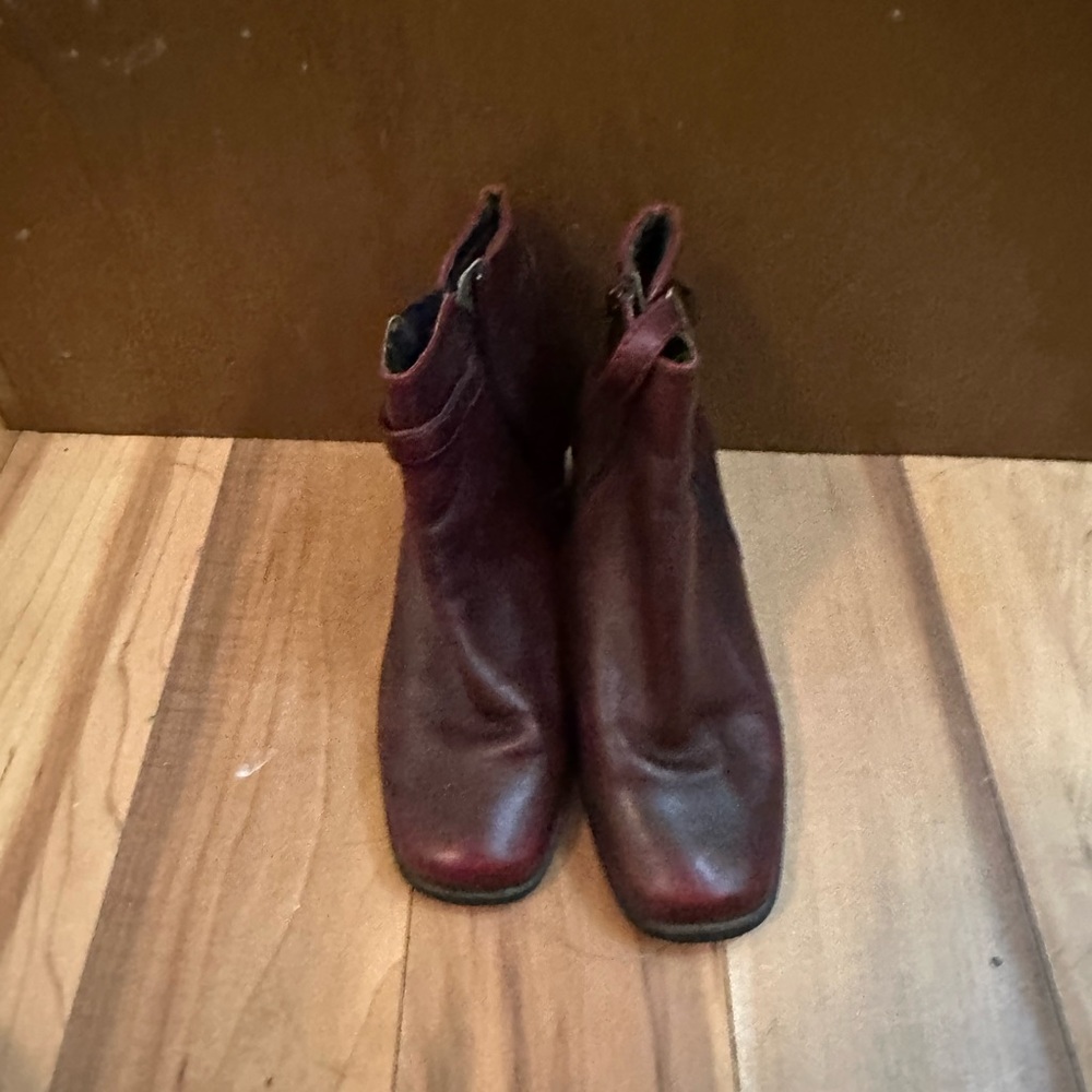 Dark red leather style ankle boots.